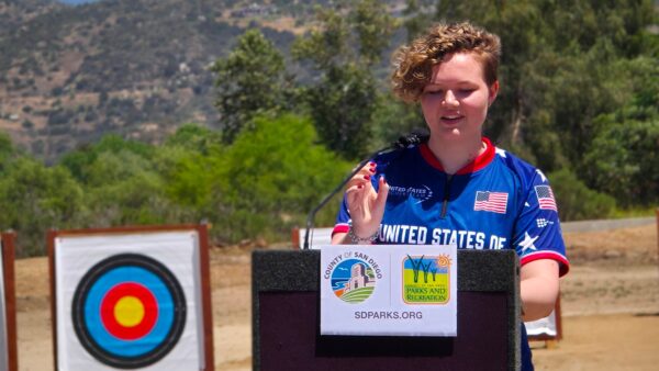 Ellie Howe at the podium, May 2025